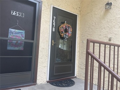 Fabulous 55+ Upstairs FURNISHED TURNKEY condo with great views on Country Club At Silver Springs Shores in Florida - for sale on GolfHomes.com, golf home, golf lot