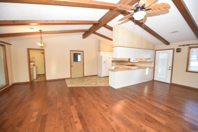 Beautiful one-level home in Fairfield Bay with stunning views of on Indian Hills Country Club in Arkansas - for sale on GolfHomes.com, golf home, golf lot