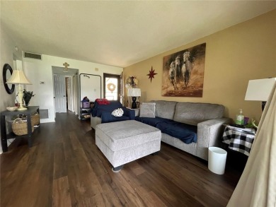 Fabulous 55+ Upstairs FURNISHED TURNKEY condo with great views on Country Club At Silver Springs Shores in Florida - for sale on GolfHomes.com, golf home, golf lot