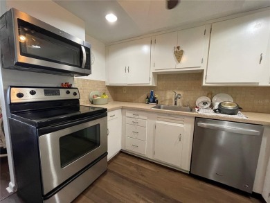 Fabulous 55+ Upstairs FURNISHED TURNKEY condo with great views on Country Club At Silver Springs Shores in Florida - for sale on GolfHomes.com, golf home, golf lot