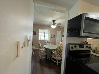Fabulous 55+ Upstairs FURNISHED TURNKEY condo with great views on Country Club At Silver Springs Shores in Florida - for sale on GolfHomes.com, golf home, golf lot
