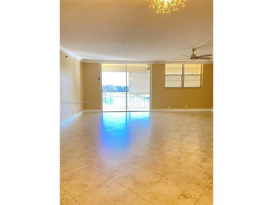 Amazing 2/2 on the 4th Floor unit, overlooking the lake & golf on Grande Oaks Golf Club in Florida - for sale on GolfHomes.com, golf home, golf lot