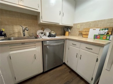 Fabulous 55+ Upstairs FURNISHED TURNKEY condo with great views on Country Club At Silver Springs Shores in Florida - for sale on GolfHomes.com, golf home, golf lot