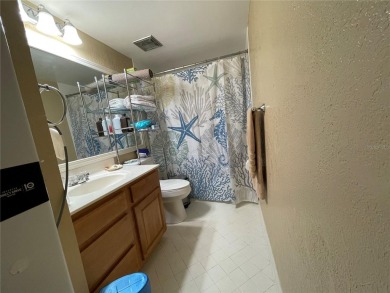 Fabulous 55+ Upstairs FURNISHED TURNKEY condo with great views on Country Club At Silver Springs Shores in Florida - for sale on GolfHomes.com, golf home, golf lot