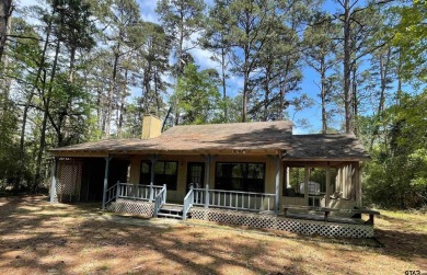 Discover the perfect retreat offering the peace, safety, and on Holly Lake Ranch Golf Club in Texas - for sale on GolfHomes.com, golf home, golf lot