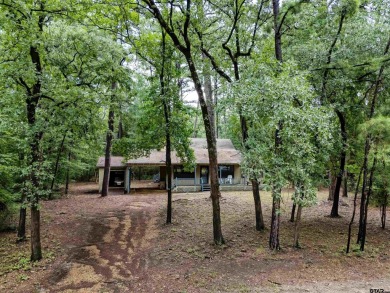 Discover the perfect retreat offering the peace, safety, and on Holly Lake Ranch Golf Club in Texas - for sale on GolfHomes.com, golf home, golf lot