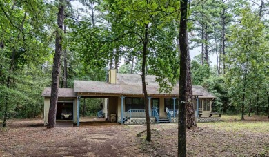 Discover the perfect retreat offering the peace, safety, and on Holly Lake Ranch Golf Club in Texas - for sale on GolfHomes.com, golf home, golf lot