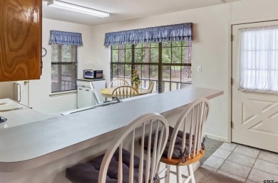 Discover the perfect retreat offering the peace, safety, and on Holly Lake Ranch Golf Club in Texas - for sale on GolfHomes.com, golf home, golf lot