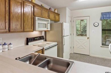 Discover the perfect retreat offering the peace, safety, and on Holly Lake Ranch Golf Club in Texas - for sale on GolfHomes.com, golf home, golf lot