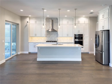 This 2021 home is available today for sale in the Famous Bella on Bella Collina Golf Club in Florida - for sale on GolfHomes.com, golf home, golf lot