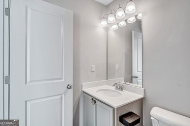 This beautifully maintained 3-bedroom, 2.5-bath townhome in the on Browns Mill Golf Course in Georgia - for sale on GolfHomes.com, golf home, golf lot