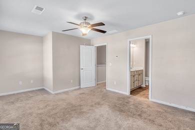 This beautifully maintained 3-bedroom, 2.5-bath townhome in the on Browns Mill Golf Course in Georgia - for sale on GolfHomes.com, golf home, golf lot