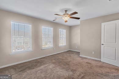 This beautifully maintained 3-bedroom, 2.5-bath townhome in the on Browns Mill Golf Course in Georgia - for sale on GolfHomes.com, golf home, golf lot