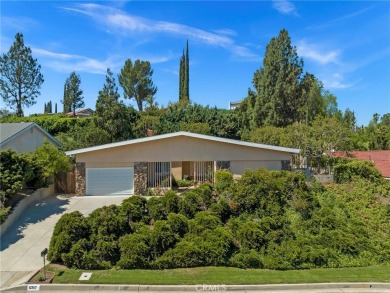 Welcome to this exquisite Mid-Century Modern single-story estate on Knollwood Golf Club in California - for sale on GolfHomes.com, golf home, golf lot