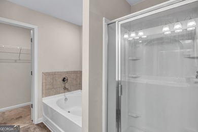 This beautifully maintained 3-bedroom, 2.5-bath townhome in the on Browns Mill Golf Course in Georgia - for sale on GolfHomes.com, golf home, golf lot