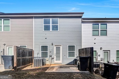 This beautifully maintained 3-bedroom, 2.5-bath townhome in the on Browns Mill Golf Course in Georgia - for sale on GolfHomes.com, golf home, golf lot