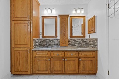 Under contract-accepting backup offers. NEW ROOF (2025), NEW on The Links of Spruce Creek in Florida - for sale on GolfHomes.com, golf home, golf lot