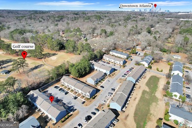 This beautifully maintained 3-bedroom, 2.5-bath townhome in the on Browns Mill Golf Course in Georgia - for sale on GolfHomes.com, golf home, golf lot