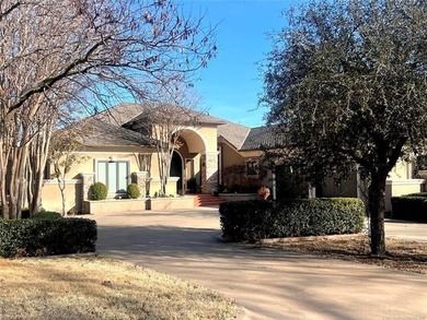 Step into luxury with this tastefully decorated on McAlester Country Club in Oklahoma - for sale on GolfHomes.com, golf home, golf lot