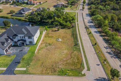 5-acre corner lot with a picturesque view in the scenic Lake on Tangle Ridge Golf Club in Texas - for sale on GolfHomes.com, golf home, golf lot
