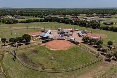5-acre corner lot with a picturesque view in the scenic Lake on Tangle Ridge Golf Club in Texas - for sale on GolfHomes.com, golf home, golf lot