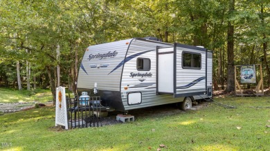 Discover a pristine 0.14-acre lot tucked away on a quiet private on River Golf and Country Club at Lake Royale in North Carolina - for sale on GolfHomes.com, golf home, golf lot