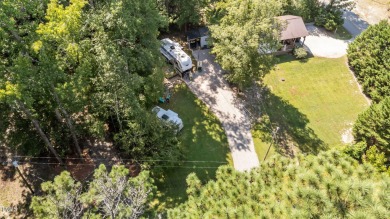 Discover a pristine 0.14-acre lot tucked away on a quiet private on River Golf and Country Club at Lake Royale in North Carolina - for sale on GolfHomes.com, golf home, golf lot