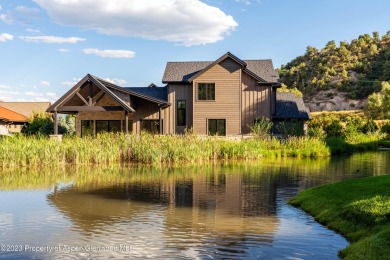 Stunning views of Mt. Sopris and nestled up to a peaceful pond on Aspen Glen Club in Colorado - for sale on GolfHomes.com, golf home, golf lot