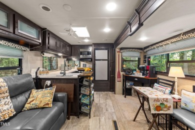 Discover a pristine 0.14-acre lot tucked away on a quiet private on River Golf and Country Club at Lake Royale in North Carolina - for sale on GolfHomes.com, golf home, golf lot