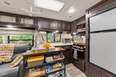 Discover a pristine 0.14-acre lot tucked away on a quiet private on River Golf and Country Club at Lake Royale in North Carolina - for sale on GolfHomes.com, golf home, golf lot
