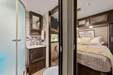 Discover a pristine 0.14-acre lot tucked away on a quiet private on River Golf and Country Club at Lake Royale in North Carolina - for sale on GolfHomes.com, golf home, golf lot