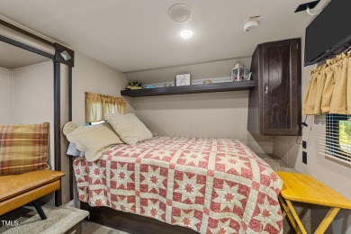 Discover a pristine 0.14-acre lot tucked away on a quiet private on River Golf and Country Club at Lake Royale in North Carolina - for sale on GolfHomes.com, golf home, golf lot