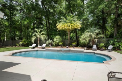 Welcome to this stunning pool home in India Station--one of the on Haile Plantation Golf and Country Club in Florida - for sale on GolfHomes.com, golf home, golf lot