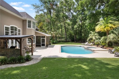 Welcome to this stunning pool home in India Station--one of the on Haile Plantation Golf and Country Club in Florida - for sale on GolfHomes.com, golf home, golf lot