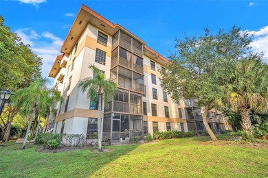 Spacious 3-bedroom, 2-bath corner unit located on the top floor on Woodlands Country Club in Florida - for sale on GolfHomes.com, golf home, golf lot