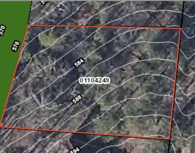 This lot has a near level building area located on a rise given on Ponce De Leon Golf Course in Arkansas - for sale on GolfHomes.com, golf home, golf lot