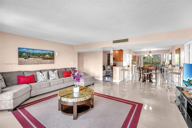 Spacious 3-bedroom, 2-bath corner unit located on the top floor on Woodlands Country Club in Florida - for sale on GolfHomes.com, golf home, golf lot