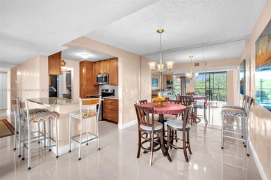 Spacious 3-bedroom, 2-bath corner unit located on the top floor on Woodlands Country Club in Florida - for sale on GolfHomes.com, golf home, golf lot