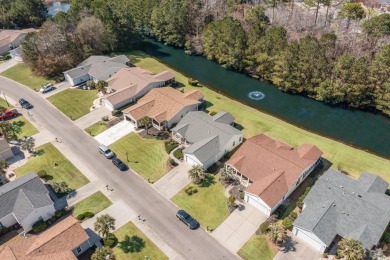 631 Lake Estates Court is a magnificent home on a scenic canal on Burning Ridge Golf Course in South Carolina - for sale on GolfHomes.com, golf home, golf lot