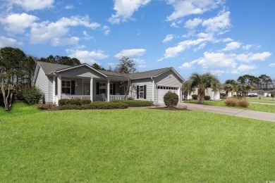 631 Lake Estates Court is a magnificent home on a scenic canal on Burning Ridge Golf Course in South Carolina - for sale on GolfHomes.com, golf home, golf lot