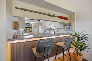 Welcome to your carefree slice of paradise in Bird Bay Village. 
 on Bird Bay Executive Golf Club in Florida - for sale on GolfHomes.com, golf home, golf lot
