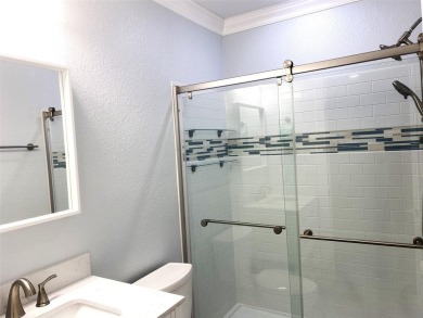 If you are looking for a fully updated, ground floor, lakefront on On Top Of The World Golf Course in Florida - for sale on GolfHomes.com, golf home, golf lot