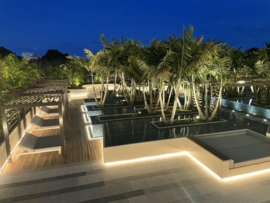 Experience Boca's Beauty from this Lanai Residence with a on Boca Raton Resort and Club in Florida - for sale on GolfHomes.com, golf home, golf lot