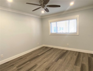 If you are looking for a fully updated, ground floor, lakefront on On Top Of The World Golf Course in Florida - for sale on GolfHomes.com, golf home, golf lot