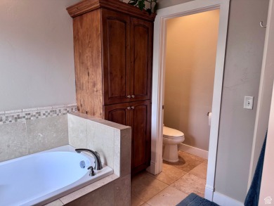 Welcome to your dream home, nestled in a serene golf course on Roosevelt Municipal Golf Course in Utah - for sale on GolfHomes.com, golf home, golf lot