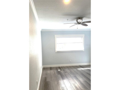 If you are looking for a fully updated, ground floor, lakefront on On Top Of The World Golf Course in Florida - for sale on GolfHomes.com, golf home, golf lot