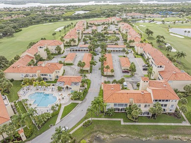 Sweeping golf views from this pied-a-terre in prestigious on Oak Harbor Country Club in Florida - for sale on GolfHomes.com, golf home, golf lot