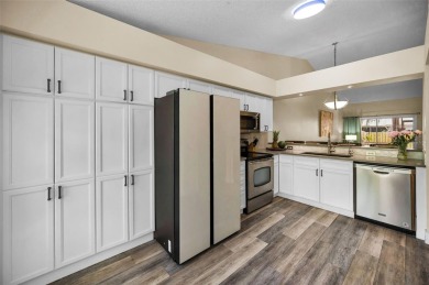 Welcome to this expansive 3-bedroom, 2.5-bath townhome in the on Countryside Country Club in Florida - for sale on GolfHomes.com, golf home, golf lot
