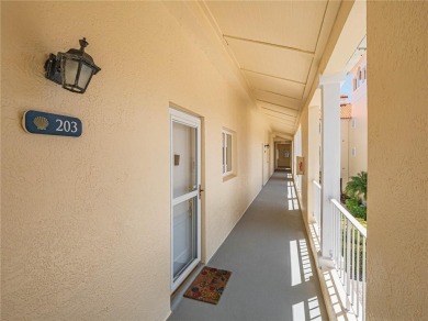 Sweeping golf views from this pied-a-terre in prestigious on Oak Harbor Country Club in Florida - for sale on GolfHomes.com, golf home, golf lot