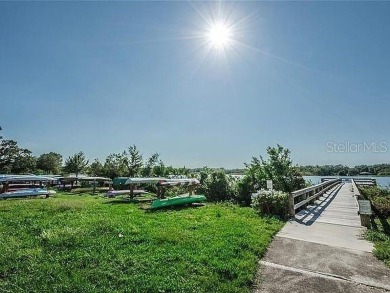 If you are looking for a fully updated, ground floor, lakefront on On Top Of The World Golf Course in Florida - for sale on GolfHomes.com, golf home, golf lot